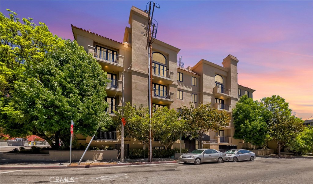 Step into this light-filled, single-level beautiful 2 Bedroom, 2 Bathroom Condo near UCLA in Westwood. This spacious condo features soaring ceilings, recessed lighting, laminate floors, and two inviting fireplaces. French doors lead out to two private balconies, ideal for enjoying your morning coffee or unwinding in the evening. The expansive primary suite serves as a peaceful sanctuary, offering a generous walk-in closet and a luxurious ensuite bathroom with a soaking tub, separate shower, and dual vanities. The second bedroom and full guest bath are situated on the opposite side of the unit, allowing for maximum privacy and quiet. The well-appointed kitchen boasts ample cabinetry and counter space, creating a smooth workflow for both everyday cooking and entertaining. A separate dining area, complete with a built-in wet bar, opens gracefully into the spacious living room, providing an ideal setting for gatherings. Just off the main living area is a cozy alcove, perfect for a dedicated workspace or reading corner. Practical amenities include an in-unit washer and dryer, two tandem parking spots, and convenient guest parking. Located just minutes from UCLA, Westwood Village, trendy restaurants along Westwood Blvd, The Hammer Museum, freeway access, Westwood Park, and the future Metro station, this home blends urban convenience with tranquil living. Don’t miss your chance to make it yours—homes like this don’t stay on the market for long!