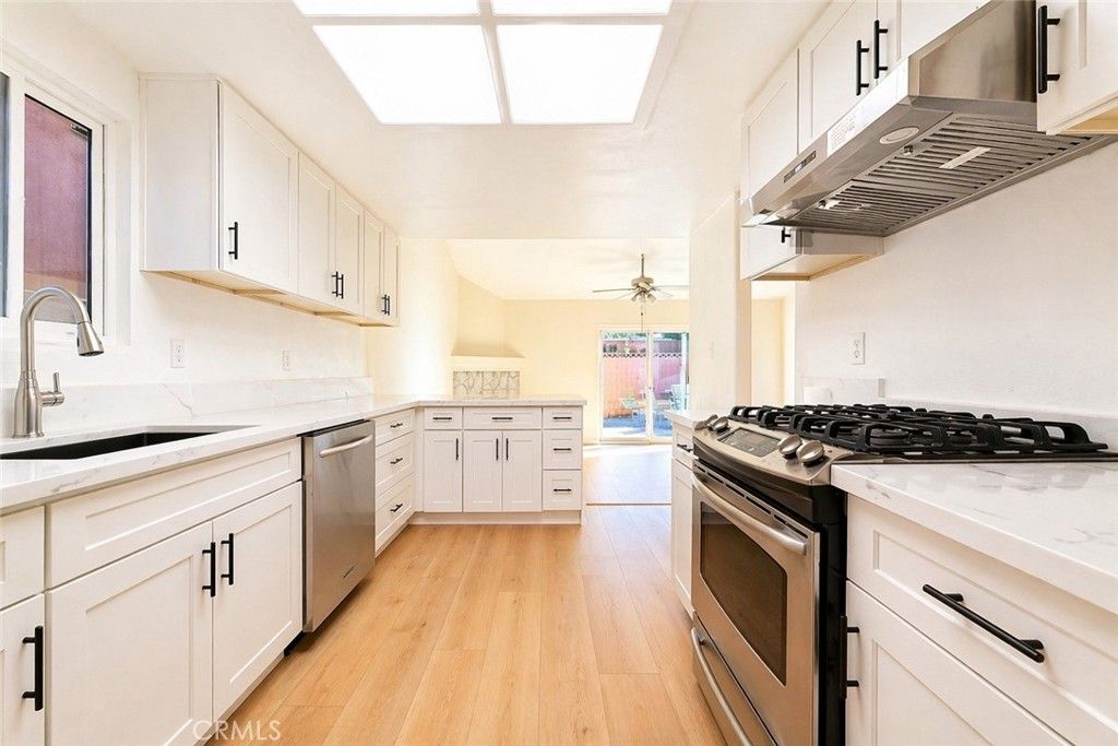 Photo of 5901 Mckinley Ave, South Gate, CA 90280 (MLS # OC26090651)