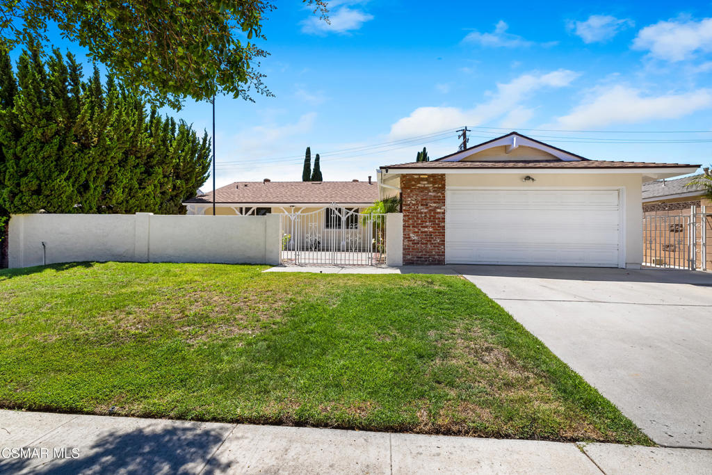 Welcome to this beautifully maintained single-story home nestled in a quiet, well-established Simi Valley neighborhood. Offering great curb appeal and a gated courtyard entrance, this residence features 4 spacious bedrooms, 2 bathrooms, and nearly 1,600 square feet of inviting living space. Inside, you'll find freshly painted interiors, brand-new carpeting, smooth ceilings, and gleaming wood laminate floors. The bright and open living and dining areas are perfect for entertaining, while dual-pane windows provide energy efficiency and an abundance of natural light throughout. The kitchen features tile flooring, a convenient breakfast bar, plenty of cabinet and counter space, and opens to a cozy family room--ideal for everyday living. The primary suite includes a generous wardrobe closet and a private en suite bathroom. Three additional bedrooms offer ample space and there is a full hall bathroom. Step outside to enjoy a nice grassy yard, a covered patio perfect for relaxing or entertaining, and a handy storage shed. Additional highlights include central air and heating, a direct-access two-car garage, and a prime location close to schools, shopping, and easy freeway access. Priced to sell - schedule your private tour today before it's gone!