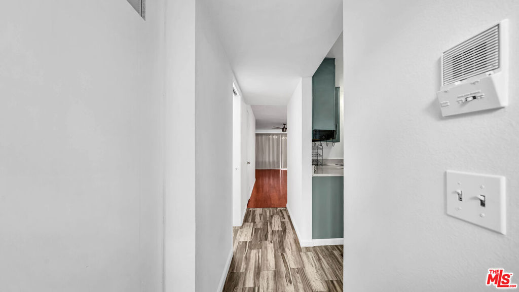 This move-in ready, spacious 2-bedrooms, 3-bath condominium boasts numerous amenities and a prime location walking distance to churches, schools, the library, restaurants, Compton City Hall, and other governmental agencies and landmarks. The unit features a guest bathroom downstairs, upgraded kitchen with stainless steel appliances, living room with laminate flooring that leads to a private balcony, ideal for entertaining and family gatherings, recessed lights, and ceiling fans throughout. Fresh interior paint adorns the upstairs area, which includes two spacious bedrooms, washer and dryer hookups, a private bathroom in the primary bedroom with ample closet space, and Central Air and Heat. This unit offers a pleasant view of the pool, perfect for relaxation and entertainment. Additionally, it features a private, gated garage with two side-by-side assigned parking spaces. Another plus is, it is seconds from Compton High School where Dr. Dre donated over $10M to fund "Dr. Dre Performing Arts Center which is absolutely gorgeous. Do not miss out on this opportunity to own prime real estate.