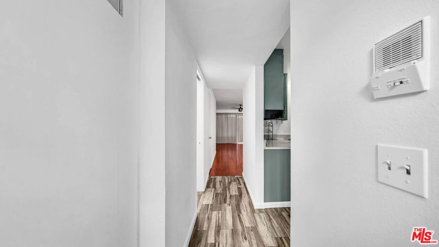 This move-in ready, spacious 2-bedrooms, 3-bath condominium boasts numerous amenities and a prime location walking distance to churches, schools, the library, restaurants, Compton City Hall, and other governmental agencies and landmarks. The unit features a guest bathroom downstairs, upgraded kitchen with stainless steel appliances,  living room with laminate flooring that leads to a private balcony, ideal for entertaining and family gatherings, recessed lights, and ceiling fans throughout.  Fresh interior paint adorns the upstairs area, which includes two spacious bedrooms, washer and dryer hookups, a private bathroom in the primary bedroom with ample closet space, and Central Air and Heat. This unit offers a pleasant view of the pool, perfect for relaxation and entertainment. Additionally, it features a private, gated garage with two side-by-side assigned parking spaces.  Another plus is, it is seconds from Compton High School where Dr. Dre donated over $10M to fund "Dr. Dre Performing Arts Center which is absolutely gorgeous.   Do not miss out on this opportunity to own prime real estate.