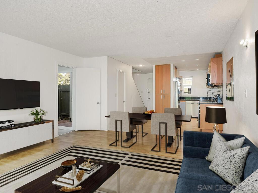 Opportunity to own a spacious 4 Bedroom – 2 Bath, 1154 sqft two-story condo in the vibrant Chula Vista area. This peaceful community is within walking distance to Third Avenue, offering dining, shopping, a library, and a beautiful park. The floor plan includes one bedroom conveniently located downstairs and three bedrooms upstairs, each with high vaulted ceilings and private balconies. A laundry closet with washer and dryer hookups is located in the front patio, and both a front and back patio provide plenty of outdoor living space. Parking is convenient with two spaces: one assigned carport with storage and one additional space available with a permit. The HOA covers water and trash pickup, and residents also enjoy the community swimming pool. This condo combines comfort, functionality, and a prime location — a fantastic opportunity to enjoy the best of Chula Vista living.