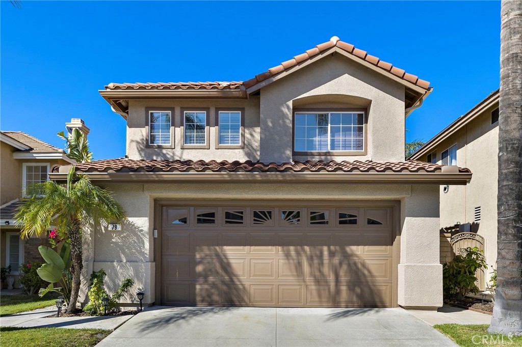 This beautifully remodeled home has countless unique features & is located in California Vista within the wonderful hillside community of Foothill Ranch.This bright & spacious 4 bed + loft & 2.5 bath home make up the 2,057 sqft of comfortable living space.The open floor plan offers large windows that illuminate natural light throughout.Entertaining is effortless w/ an adjoining dining area w/ gorgeous views of the backyard. The family room is spacious & comfortable offering a cozy fireplace w/ trendy stacked stone accent wall.Opening to the family room is the remodeled kitchen which is equipped w/ stainless steel appliances, quartz countertops w/ tile backsplash, stunning cabinetry, large island & breakfast nook. Include custom designer paint, wood-finished laminate flooring, upgraded baseboards, all remodeled bathrooms & a convenient inside laundry room w/ cabinets.The spacious master suite offers high ceilings, a walk-in closet, dual vanity & a large glass enclosed rainfall shower. Custom shutters throughout upstairs windows. Beautifully manicured backyard offers the perfect combination of hardscape & landscape to dine alfresco or enjoy a soak in the relaxing hot tub. Enjoy this perfectly located home—w/ close proximity to Whiting Ranch Wilderness Park w/ over 2,500 acres of wilderness hiking & world class mountain biking, a Blue Ribbon elementary school & all of the shopping, dining, & theaters that Foothill Ranch has to offer.