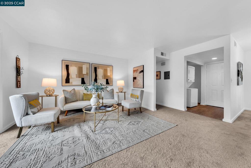 Sweet & Stylish Condo – Move-In Ready! Bright, cozy, and full of charm! This beautifully updated 2-bedroom, 1-bathroom condo offers comfortable living with modern upgrades in a prime location. Step inside to find: New floor tile and carpet, Fresh interior paint, Brand-new patio door, New window shutters, Upgraded light fixtures, Tastefully updated bathroom. The fully renovated kitchen is sure to impress with elegant quartz countertops, tile backsplash, custom cabinetry, and modern stainless steel appliances—a perfect blend of style and function. The dining area flows seamlessly into the cozy living room featuring a fireplace and access to a private patio overlooking the pool and lush common areas—ideal for relaxing or entertaining.Enjoy access to on-site amenities including a fitness room, and walk to vibrant downtown shops, dining, and entertainment. Move in and enjoy—this home has it all!