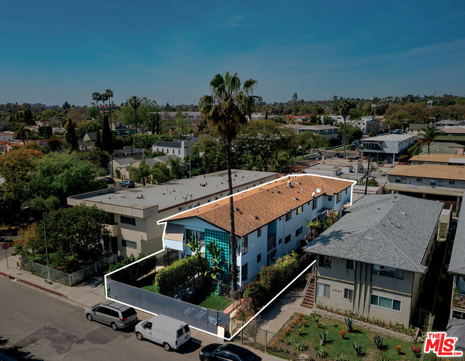 We are proud to present 2051 S Corning St, a 6-unit property located in the Palms submarket priced at a 5.24% CAP and a 111.99 GRM! This opportunity consists of a single, two-story building built in 1960 comprising of 6,448sf situated on a 6,307sf LARD1.5 zoned lot featuring a superior unit mix of (5) three-bedroom two bath and (1) studio units. 4 of 6 units have been renovated and the Earthquake Retrofit has been completed! With alley access, this property features 5 parking spaces in the rear, providing tenants easy access to and from the building. One three-bedroom two bath unit, featuring a private yard, will be delivered VACANT and renovated. There is potential to operate the building at a 7.04% cap rate and 9.74 GRM at market rents, offering an exceptional opportunity for any type investor looking to preserve capital while continuing to drive long term returns in an exceptionally robust submarket that is continuing to improve with ongoing development. Contact the listing broker for additional details.