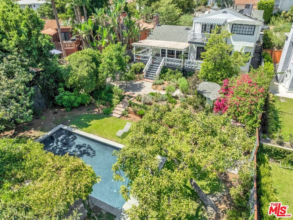 Located in Silver Lake's coveted Moreno Highlands, this fully furnished 3BR/2BA 2,282 sq.ft. residence offers hillside and lake views, and is close to the Reservoir Trail and Dog Park. The home's main level features a step-down living room with a fireplace that flows into a private dining area, both with French sliding doors that open to a spacious patio for al fresco dining and entertaining. Also on this level are a galley kitchen with a dining nook, a versatile bonus space with heated floors, and a full bathroom. A second floor landing opens to 3 light-filled bedrooms (2 with lake views). The primary bedroom includes a walk-in closet and a balcony that overlooks the reservoir. A full bathroom serves the upper level's bedrooms. The house's additional amenities include a laundry area (accessible from both inside and outside), a separate storage structure (suitable for work or play), and a generous 8,352 sq.ft. flat lot with a resort-style saltwater pool (with cover). Driveway parking (uncovered) and plenty of street parking. Ivanhoe School District. This chic, furnished residence offers boutique hotel-style comfort and easy connectivity to all the area has to offer. Minimum 760 FICO. Monthly Income: 3x rent amount.