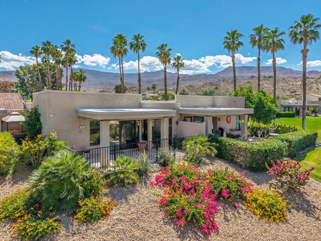 Welcome to Sommerset South Palm Desert! This Freshly updated condo combines modern upgrades with stunning valley views! Featuring brand new Luxury plank flooring and plush carpet in the bedrooms, the condo offers comfort throughout. The spacious kitchen is highlighted by new Quartz countertops, while the main bedroom has been tastefully remodeled with new mirror wardrobe doors. Enjoy the convenience of an indoor laundry area and the natural light that pours into the airy atrium. Step outside to the oversized, elevated private patio-perfect for entertaining or relaxing while taking in the panoramic views across the valley. Additional features include a one-car garage plus a carport. Best off all, you own the land, and the community offers low HOA fees. There are community pool and spas as well as tennis courts. Only a few miles to El Paseo for fine dining and shopping. Just blocks away from great hiking trails. This condo is move-in ready for the season and won't last long!