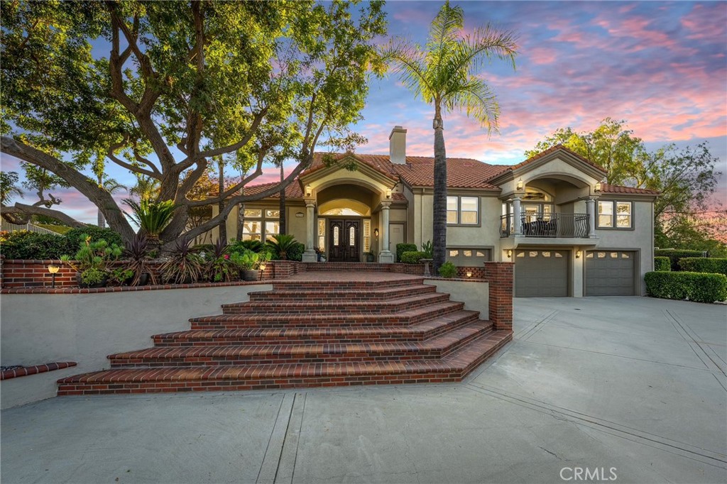 Luxury Live Auction! Bidding to start from $1,500,000!
Discover the perfect harmony of luxury, privacy, and functionality in this exceptional 4-bedroom, 3.5-bathroom custom estate, ideally situated in the heart of Murrieta on a fully gated 2.16-acre lot. Thoughtfully designed by its original owner, this remarkable residence spans over 4,000 square feet of beautifully curated living space, blending elegance with everyday comfort.
Step through the grand entry into an open-concept layout that effortlessly connects formal and casual living areas. The chef’s kitchen is a true showpiece, featuring a massive granite island, Sub-Zero refrigerator, and top-of-the-line appliances—perfect for entertaining or intimate family meals. The expansive main-floor primary suite offers a tranquil retreat, complete with a spa-inspired bathroom and private sitting area. Upstairs, you'll find a cozy theater room with balcony access, a secret-entry oversized bedroom, additional guest rooms, and a spacious loft with bonus attic storage—providing flexibility for multi-generational living or work-from-home needs.
The resort-style backyard is an entertainer’s dream, boasting a sparkling pool and spa, built-in BBQ, standalone covered patio with a fireplace, and meticulously manicured landscaping designed for privacy and serenity. A rare 2,400 sq ft (60x40) steel building sits at the rear of the property—ideal for a workshop, car collection, home business, or secure storage for RVs, boats, and recreational toys. Two RV clean-out stations, dual driveways, and abundant parking further enhance the estate’s incredible functionality. A high-producing private well services the entire property, offering self-sufficiency and cost efficiency.
This property also presents a unique development opportunity, with plans drawn for a 64-unit residential complex (48 one-bedroom and 16 two-bedroom units) on the 2.16-acre parcel. Zoned Office (O) and within the General Plan’s Office & Research Park (ORP) focus area, this site is ideally positioned in the Golden Triangle North—a rapidly growing area of Murrieta. The planned development includes 104 parking spaces and a 4-story building with elevator access, offering significant future upside for developers or investors.
Whether you're seeking a private family compound, a hobbyist’s haven, or a prime development site with major potential, this one-of-a-kind estate delivers sophistication, space, and freedom rarely found in Southern California.