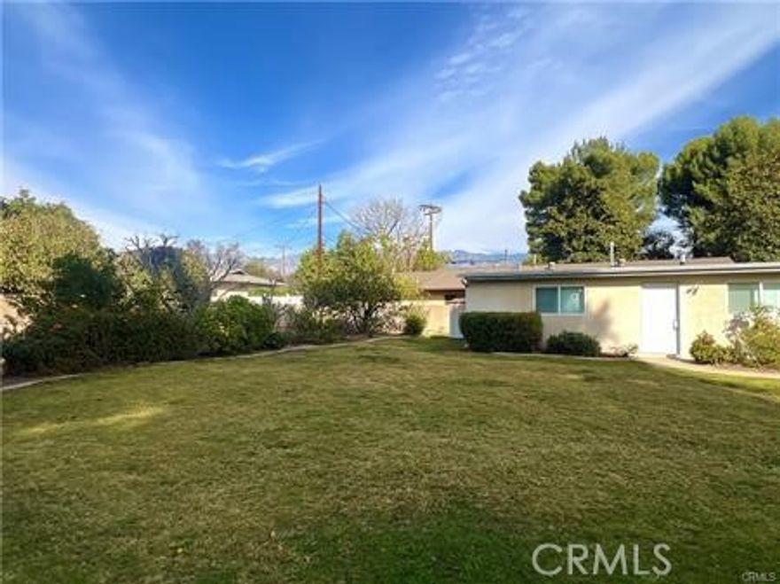 Listen to the birdsong in this secluded two bedroom, one full bathroom, one story guest house, set back from the street. Large, flat, fenced yard. No adjoining walls. Remodeled kitchen with newer cabinets, tiled backsplash, granite countertops, stove hood. Newer interior paint. Newer double-pane windows, dishwasher, wall heater, wall A/C, ceiling fan in living room, bathroom tub tile surround, vanity and bathtub. Laminate and tile flooring throughout. Stove and dishwasher included. Located in a historic Pasadena area, close to the Gamble House, Kidspace Museum, Norton Simon Museum and Rose Bowl. Stackable washer and dryer hook-ups in kitchen. Use of storage shed nearest to the house included. One car carport plus ample driveway parking. Commute friendly to two freeways. This is the rear house of two homes on a lot - you will have the entire use of the fenced backyard. Come and see, this won't last long!