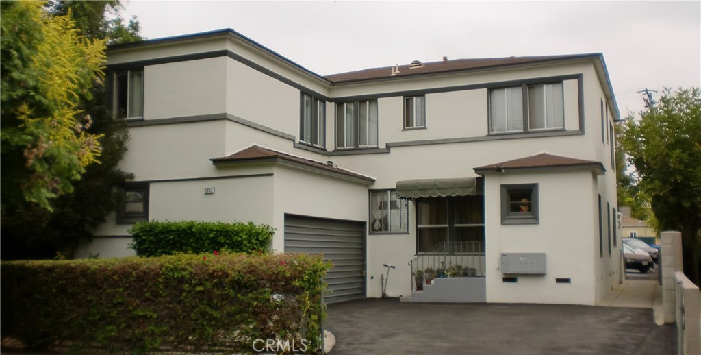 Property consists of two separate structures, a double-car garage plus eight open parking spaces serviced by a rear alley.
The front building has five units including one 3 BD/1 & 1/2 BA unit and four 2BD/1BA units. The rear building is a 2 BD/1
BA single family house. Great rent income upside on tenant turnover.