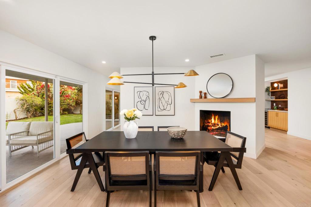 Reimagined Mid-Century Modern in Baldwin Hills! This fully renovated single-story stunner pairs iconic mid-century style with fresh, modern updates. An open layout connects living, dining, and kitchen spaces, highlighted by wide-plank floors, rich earth tones, and two fireplaces. The designer kitchen impresses with flat-panel oak cabinetry, quartz counters, oversized island, pot filler, and stainless appliances. The primary suite offers a slatted wood accent wall, walk-in closet, and spa-like bath. Two additional bedrooms add flexibility for guests, office, or gym. Large sliders open to a private backyard with covered patio and lush landscaping—perfect for indoor-outdoor living. Owned solar provides energy efficiency. Moments from SoFi Stadium, the Forum, USC, and DTLA, this home delivers timeless design and turnkey convenience in one of L.A.’s most iconic hillside neighborhoods.