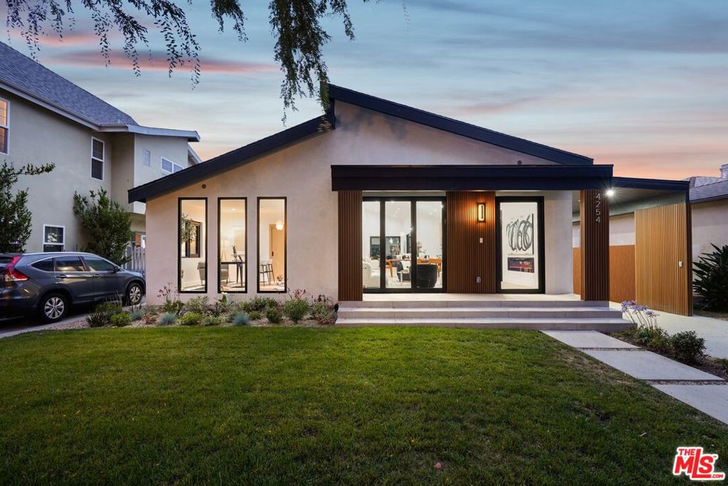 Excited to present a thoughtfully renovated four-bedroom, three-bathroom, single-story residence located on one of the most picturesque, tree-lined streets in Culver City's coveted Carlson Park neighborhoodright across from the park itself. The inviting curb appeal welcomes you into a home that balances warmth with elevated design. Enter and be immediately embraced by the sense of openness, thanks to soaring 16-foot ceilings and an expansive great room filled with natural light. A wall of glass accordion doors opens wide to the west-facing backyard, drawing in golden afternoon sun and offering a refreshing indoor-outdoor flow perfect for entertaining or relaxing at home. The heart of the home is the chef's kitchen, where creativity and conversation naturally come together. A generous center island with prep sink anchors the space, surrounded by custom cabinetry and professional-grade Thermador appliances, including an eight-burner range and built-in coffee maker. Whether you're hosting a lively dinner party or savoring a quiet morning espresso, this space is designed for everyday luxury. Adjacent to the kitchen and living area, a powder bath offers a stylish and convenient touch for guests. Just beyond, the layout leads to the bedroom wing, where privacy and comfort take center stage. At the front of the home, a bright and airy bedroom with fixed-pane windows makes for an ideal home office, creative studio, or guest space, filled with soft light throughout the day. Two additional bedrooms are generously sized and share a beautifully appointed full bathroomperfect for family, guests, or flexible living arrangements. Tucked quietly in the back, the primary suite offers a secluded retreat. A sliding glass door opens directly to the backyard, providing a peaceful connection to the outdoors. Inside, the suite features a spacious walk-in closet and a spa-inspired bathroom with dual vanities, a freestanding soaking tub, and a luxurious walk-in shower. From both the living area and the primary bedroom, you're drawn into the backyard oasis, where two oversized sliding glass doors create a graceful transition to the outdoors. Dine al fresco under the open sky, host friends for summer BBQs, or simply unwind in your private, sun-drenched garden. The covered driveway provides ample parking for multiple vehicles, and the detached garage presents an exciting opportunity to convert into an ADU, studio, or home gym. The home also comes with approved plans for a 380 SQFT ADU with a ready to pull permit! Living here means embracing one of the Westside's most cherished communities. With Carlson Park just across the street and Downtown Culver City only minutes away, you'll enjoy access to award-winning restaurants, boutiques, and cultural gems like The Culver Steps, The Platform, and the historic Culver Hotel. Outdoor enthusiasts can explore the Ballona Creek bike path, Baldwin Hills Scenic Overlook, or weekend hikes at the Culver City Stairs. With its thoughtful design, flexible layout, and unbeatable location, this home is more than just a place to liveit's a lifestyle ready to be enjoyed.