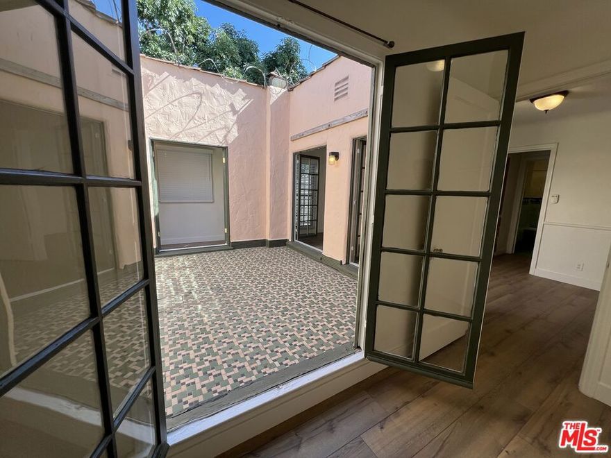 Step back in time to this 1930s gem, where vintage charm meets modern comfort. Featuring rare original art-deco tilework, this home revolves around a private atrium/courtyard, creating an inviting, light-filled flow. This 2-bedroom, 1.5 bath home features luxury vinyl plank flooring, ample storage, and versatile spaces to make your own. This home has so many possibilities, you can truly let your creativity flow! Within 2 blocks of the Midtown Shopping Center & Midtown Crossing, which includes a Sprouts, Target, Starbuck's, gym and numerous other convenient shops, this home includes a washer/dryer, fridge, stove, dishwasher, microwave, and an attached private 2-car garage.