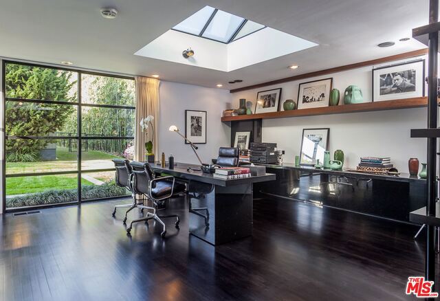 International Style Estate :: Thornton Abell, FAIA, 1965. Gated steel, glass and wood pavilion house elegantly reposing on over three-quarters of tree-studded site: Voluminous high-ceilinged glass enclosed living room, formal dining, library/study, kitchen and breakfast room, media room. Master suite constitutes its own wing with private garden, double baths, many closets and full gym. Six guest bedrooms with four additional baths. Studio/guesthouse with bath and cooking facilities overlook the pool. Four hearths, atrium, hardwood floors, ponds all enclosed in private, meandering grounds.