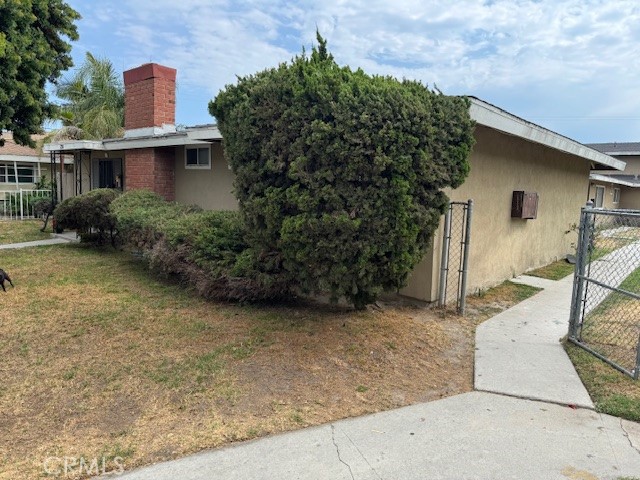 Elevate your investment portfolio or enhance your family's living experience with this meticulously maintained Anaheim fourplex. This prime property seamlessly combines convenience and robust growth potential, offering two 2-bed, 2-bath units and two 2-bed, 1.5-bath units designed to cater to diverse needs. Beyond the well-crafted units, a charming garden provides the ideal setting for quality family time. In addition to these features, the front unit boasts a cozy fireplace, while all units offer patios or balconies. Furthermore, the property includes five enclosed garages, ensuring ample parking for all residents. The enclosed patios grant residents extra outdoor living space to relish. Whether you're an investor seeking reliable returns or a family in search of an exceptional living space, this property offers the best of both worlds. Additionally, it benefits from excellent connectivity to major transportation hubs, ensuring promising returns for investors. Its close proximity to Knott's Berry Farm, major freeways, and the burgeoning landscape of new residential and commercial developments positions it perfectly for both growth and recreational opportunities.