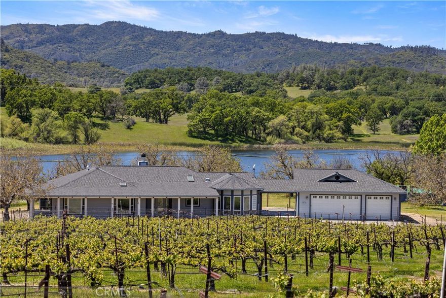Nestled within the scenic Kelsey Bench AVA this 86 acre estate boasts 32.6 acres planted to Cabernet, Montepulciano and Sangiovese  grapes, promising a bounty of premium harvests. The lush vineyard features a pond and cleared acreage for additional vine planting. 

At the heart of the estate stands the main residence. Step inside to discover an inviting open layout adorned with panoramic vistas of the surrounding vineyard, inviting in the tranquility of the natural landscape. The residence offers 4 bedrooms and 3 baths, ensuring ample space for both relaxation and entertainment. A spacious living room, adorned with a rustic fireplace, serves as the focal point for gatherings, while coffered ceilings, recessed lighting, and skylights imbue the space with an ambiance of warmth.

Outside, a beautifully landscaped backyard beckons, offering a serene retreat amidst verdant greenery. A detached two-bay garage, stamped concrete circular driveway and additional cover for large equipment, such as a tractor, provides convenient storage for vehicles and equipment.

Meticulously managed for years, the vineyard boasts well water and reservoir rights for irrigation, ensuring optimal conditions for grape cultivation and harvest. Whether indulging in the art of winemaking or simply savoring the tranquility of country living, this estate offers a rare opportunity to experience the quintessential charm of wine country living at its finest.
