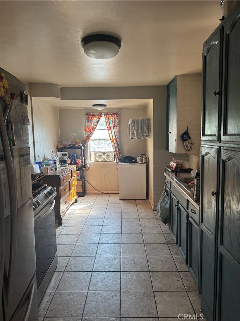 Photo of 633 S Downey Rd, Los Angeles, CA 90023 (MLS # OC25244007)