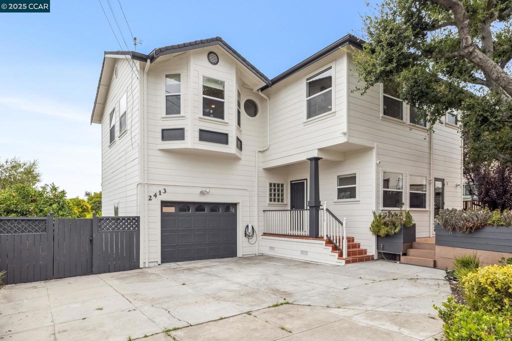Extremely Rare Opportunity in Lincoln Heights! Tucked away from the street in one of Oakland’s most sought-after neighborhoods, this beautifully refreshed 4BD/3BA home offers a perfect blend of privacy, space, and style. Just painted inside and out, including freshly painted kitchen cabinets, the home feels bright, clean, and truly move-in ready. Step into the spacious living room featuring a cozy fireplace, a wall of windows, and French doors that open to a serene, oversized deck thoughtfully built around a majestic oak tree—perfect for relaxing or entertaining. The open floor plan continues into the dining area and beautiful kitchen. A convenient bedroom and full bath are located on the main level—ideal for guests or a home office. Upstairs, you'll find a bright and airy family room with charming bay windows and lovely hill views. The primary suite includes a large walk-in closet and a generous en-suite bath. Two additional bedrooms and a full bath complete the second level. Golden wood floors run throughout, and the outdoor space is just as inviting—with a sunny deck, level lawn, veggie beds, and a flourishing lemon tree. All this, with easy access to local shops, cafe and everything you love about Oakland.