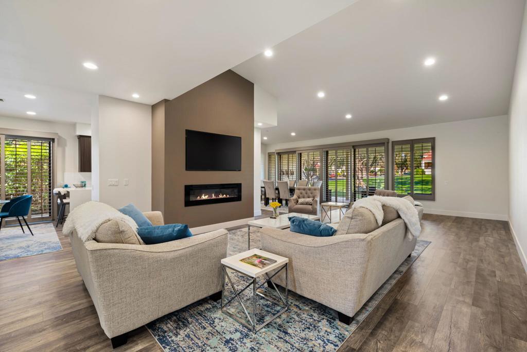 This gorgeous remodeled 3 bedroom/3 bath home sits on a quiet interior location, inside the gates of the prestigious Desert Horizons Country Club. The home has a spacious living and dining room with over 2800 sq ft of living space. The living room's electric fireplace sets the tranquil mood around two sofas and sitting chairs. The updated kitchen is sure to please with stainless steel appliances, gas range, craftsman quality cabinetry, upgraded countertops and an eating area for 4. The dining area seats 6 and has westerly views overlooking the back patio and serene greenbelt. A luxurious primary bedroom offers a large king bed, TV, and a large walk-in closet. The ensuite bathroom has upgraded cabinets, counter tops, and a large 2-person walk-in shower with a built-in bench. Guests are perfectly accommodated with private bedrooms, TV's and their own patios. The 2nd bedroom offers a queen/double bed, walk-in closet and ensuite bath. The 3rd guest room and ensuite have a queen/double bed and a desk. Amenities: Nice linens, towels, dishes, utensils, ceiling fans and wood shutters can be found throughout the home. Relax out on the back patio enjoying outdoor scenery of the green belt area of swaying palms, mature fruit trees and the community pool and spa just steps away. Desert Horizons Country Club's 40,000 sq ft newly renovated clubhouse is a central feature of the community, offering dining options, social areas, and event spaces. Optional Social Membership for tenants to enjoy gourmet meals at the club's restaurant and participate in social events. The 8,000 sq ft state-of-the-art fitness & wellness center encompasses incredible views complete with equipment for cardio and strength training, as well as group exercise classes. The NEW Sports Pavilion includes 2 tennis and 11 pickleball courts encouraging recreational and competitive play. You are close to the El Paseo Shops, Championship Golf and fabulous restaurants and dining.