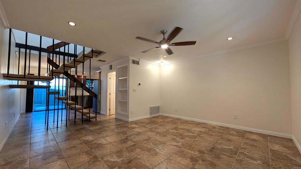 *2.25% VA ASSUMEABLE LOAN AVAILABLE TO QUALIFIED BUYERS! For sale is a 2 bedroom, 1.5 bath townhouse located in the Fletcher Valley Villas development of Santee. Located near Grossmont College and the heart of Santee, this townhome has all new paint, LVP flooring (Upstairs), and carpet (Stairs). This home has in unit laundry (High end Speed Queen Brand), central A/C, stainless appliances, quartz countertops, shared detached garage, and one assigned outdoor parking space. The development has a beautiful courtyard, central grassy park area, and pool/jacuzzi/community room.