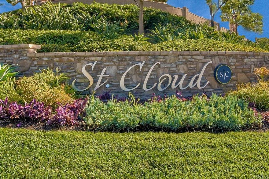 You will not want to miss this opportunity to own a custom-designed home in the St Cloud development in Oceanside. It is in pristine condition. Gorgeous, highly upgraded end unit home on one of the best premium lots in the community. Large private patio backs to green space. Only end units do not have a shared wall for ultimate privacy. Solid walnut-stained acacia hardwood floors. New luxury carpet in bedrooms. The main floor has a dining area, a living room, a large chef's kitchen with like-new high-end appliances with access to the private patio, and an upgraded half bath. The second floor has three bedrooms, two full upgraded bathrooms with custom tile. Primary suite with a large walk-in closet. Custom moldings and board and batton walls on the main floor. spacious two-car private garage with 220 Amp EV charge station Resort-like community center with pool and gym, several play areas, and lots of green space. Gated entry for security.