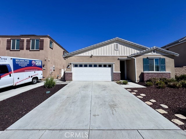 Welcome to This Stunning Single Story Home in the Meadow Run Community of Menifee! Enter inside to an inviting open concept featuring upgraded luxury vinyl plank flooring that flows seamlessly throughout the main living areas. The spacious kitchen boasts an oversized center island, sleek quartz countertops, abundant oak cabinetry, a pantry, and stainless steel appliances. The private primary suite, located just off the family room, offers a peaceful retreat with ample space and an ensuite bathroom complete with dual sinks, a walk-in shower, and a generous walk-in closet. All bedrooms are well-sized and thoughtfully positioned for comfort and privacy. For added convenience, a washer and dryer are included! Outside, enjoy a spacious backyard with a cozy patio. This beautifully upgraded home is perfectly situated just blocks from Paloma High School and next to a charming neighborhood park. Don’t miss the chance to own a stylish, move-in ready single-story home in one of Menifee’s most sought-after neighborhoods! Schedule your showing today!