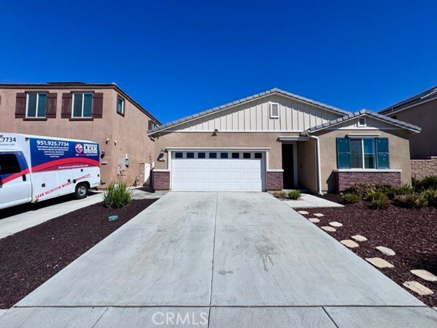 Welcome to This Stunning Single Story Home in the Meadow Run Community of Menifee! Enter inside to an inviting open concept featuring upgraded luxury vinyl plank flooring that flows seamlessly throughout the main living areas. The spacious kitchen boasts an oversized center island, sleek quartz countertops, abundant oak cabinetry, a pantry, and stainless steel appliances. The private primary suite, located just off the family room, offers a peaceful retreat with ample space and an ensuite bathroom complete with dual sinks, a walk-in shower, and a generous walk-in closet. All bedrooms are well-sized and thoughtfully positioned for comfort and privacy. For added convenience, a washer and dryer are included! Outside, enjoy a spacious backyard with a cozy patio. This beautifully upgraded home is perfectly situated just blocks from Paloma High School and next to a charming neighborhood park. Don’t miss the chance to own a stylish, move-in ready single-story home in one of Menifee’s most sought-after neighborhoods! Schedule your showing today!