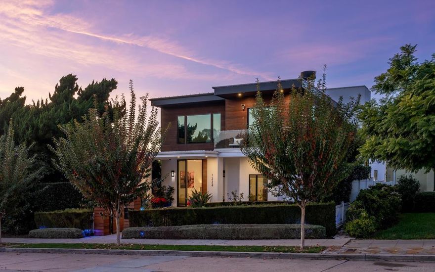 Welcome to 1224 Virginia Way, a newer build completed in 2018 offering privacy, security and polished modern living in the heart of La Jolla. Set behind a secure front gate and framed by mature landscaping, this home features an open floor plan, high ceilings and seamless indoor outdoor flow that is ideal for entertaining. The main living areas extend to a spacious outdoor patio with a spa, creating a true continuation of the home. The property also includes a backup generator for added comfort and peace of mind.  The primary suite enjoys peek ocean views, a generous layout and a spa like bathroom, along with access to a private deck featuring an infrared sauna. All bedrooms include en suite bathrooms for comfort and privacy. A well appointed rooftop deck showcases outstanding views and offers the perfect setting for gatherings, sunsets or quiet relaxation above the village.  Located in one of La Jolla’s most walkable neighborhoods, you are moments from the village shops, restaurants, cafes and coastal charm. A rare blend of newer construction, privacy and premier location.