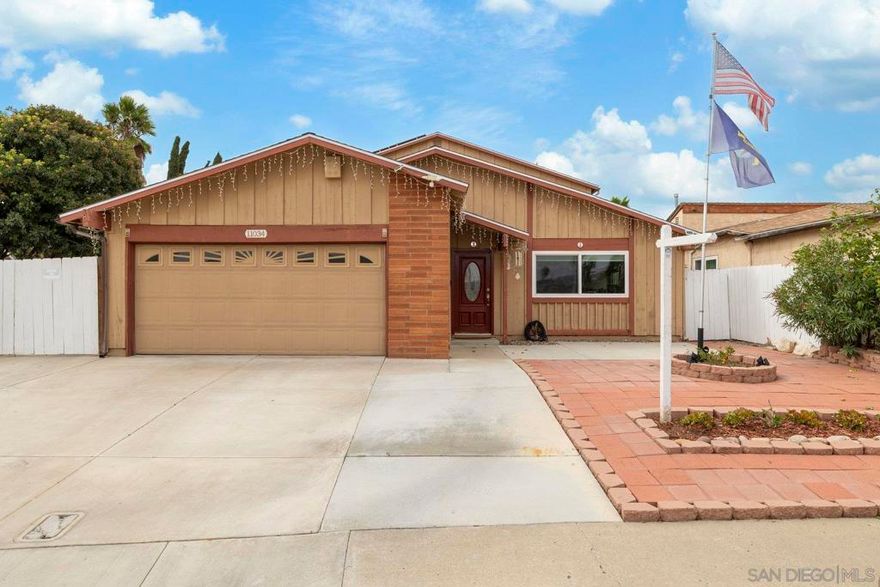 Welcome to 11034 Sagittarius – a truly exceptional multi-generational residence nestled in the vibrant heart of Mira Mesa! This expansive 5-bedroom, 3-bathroom home boasts fully paid-off solar panels and newer dual-pane windows. The first floor features a master en-suite and two additional bedrooms, while the second floor offers another master en-suite and a flexible bedroom/office space. The open-concept kitchen is equipped with stainless steel appliances and granite countertops, seamlessly flowing into an oversized dining room and living room. A separate family room, complete with a cozy fireplace, provides the perfect setting for family gatherings.  Enjoy a prime location directly across from the park and in close proximity to the community pool. Centrally situated in Mira Mesa, this home offers convenient access to I-15, I-805, 163, and 56, ensuring short commute times. Experience the generous space and advantageous location this remarkable home has to offer.