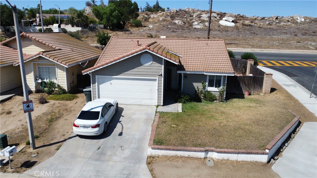 Welcome to this single story home on a corner lot in the City of Perris! This home offers 2 bedrooms, 1 Bathroom with just under 900 Sq ft of comfortable living space. Enjoy the convenience of an attached 2 car garage, ideal for parking or additional storage space. This property is perfect for first-time buyers, downsizers, or investors. Don't miss the opportunity to make it your own.