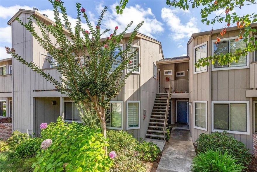 Welcome to this highly sought after Bascom Vineyards Community nestled just minutes from freeway access, shopping, restaurants, walking trails, parks, downtown Campell, and Los Gatos. This airy, sun-filled home boasts wood floors and high-quality French shutters throughout. A newly remodeled primary bath includes a new vanity, floor and porcelain stall shower with glass accents. The beautifully updated kitchen pops with solid wood cabinets, granite counters, glass backsplash, and a gas cooktop. New flooring and fixtures in the hall bath. Enjoy winter evenings by the fireplace in a vaulted ceiling living room. Other amenities include a balcony, inside laundry, ceiling fans in both the spacious primary bedroom and dining area, whole house fan, attached 2-car garage, newer furnace and hot water heater, gated community pool and more. Low HOA fees plus location, upgrades, and amenities equal excellent value for this stunning home. Step into your new home today!
