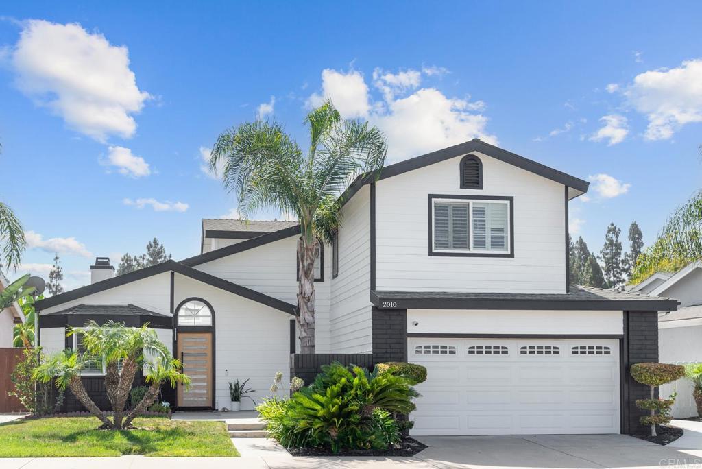 This beautifully renovated 3-bedroom, 2.5-bathroom home in Eastlake Shores offers modern comfort with dual pane windows, a cozy fireplace, and a master suite with a walk-in closet. The property includes a 2-car garage and is situated in a community with excellent amenities such as a lake, swimming pool, tennis courts, and a clubhouse. Conveniently located just steps from the lake and minutes from Village Walk at Eastlake, Eastlake Village Marketplace, and Eastlake Village Shopping Center, this charming house combines convenience with a serene setting