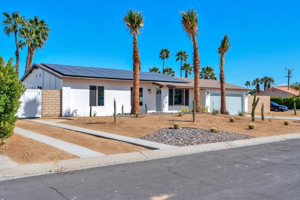 Fully remodeled from the ground up, Everything is New! Massive Corner Lot, Personal Custom Pickleball Court! Showcasing attention to detail, modern throughout, situated on a large corner lot with gorgeous mountain views. This home has it all including 2 fully paid solar panel systems. This home has new AC and Furnace along with new AC ducts, New Drywall, New Framing and Attic Insulation, New Flooring, New custom Kitchen with Stainless Steel Appliances, large Island with Quartz Counter-Tops, New Bathrooms, New Roof, large Modern Electric Fireplace, New Garage Door with Epoxied Garage Floors and new AC Mini Split in Garage. Entire Exterior is also fully New with New custom Pool and Spa and custom Landscape Pavers, 3 Hole custom Putting Green, new Pickle Ball Court, custom Fire Pit, New covered custom Patio and Barbecue, RV Parking, New Front Landscape, custom Double Gates all New Irrigation system, New Modern Fixtures Throughout and much more!