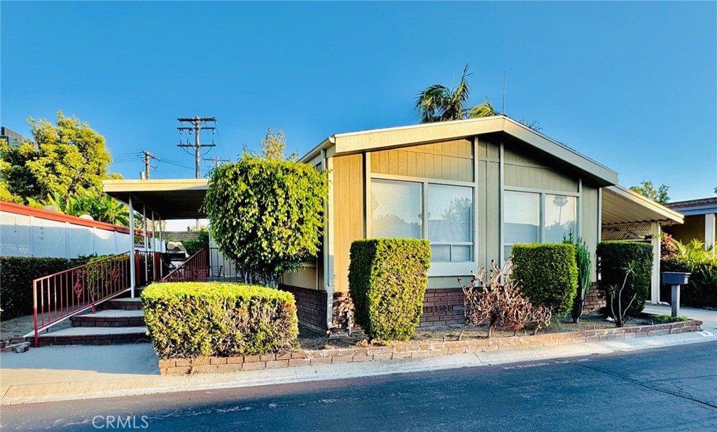 This 3 bed 2 bath manufactured home is in an All age and pet friendly park. It is a fantastic deal!
The seller is looking to sell it fast and it has the lowest price in this manufactured home community.
The A/C was replaced in 2024. In 2013 they upgraded the kitchen with granite countertops, a wall oven, renovated the ceiling with new lighting, installed wood flooring in the living room and bed rooms, and put tile in the 2 bathroom rooms. The living room has high ceilings making it feel more spacious. It is very bright with multiple windows providing natural lighting.The washer, dryer and refrigerator are in the unit.
The lot is bigger than most of the other units and it has a large private patio.
There is a fruitful lemon tree and a kumquat tree and plenty of space for a your own personal garden.
This home is conveniently located near the guest parking and the community clubhouse, pool, jacuzzi, BBQ grill and pool table. Perfect for entertaining family and friends.
It is easy to access the 91 and 5 Freeways and it is close to Costco, In and Out Burger, McDonald's, Food4less, and Walgreens etc. This home will not last long, schedule your appointment today!