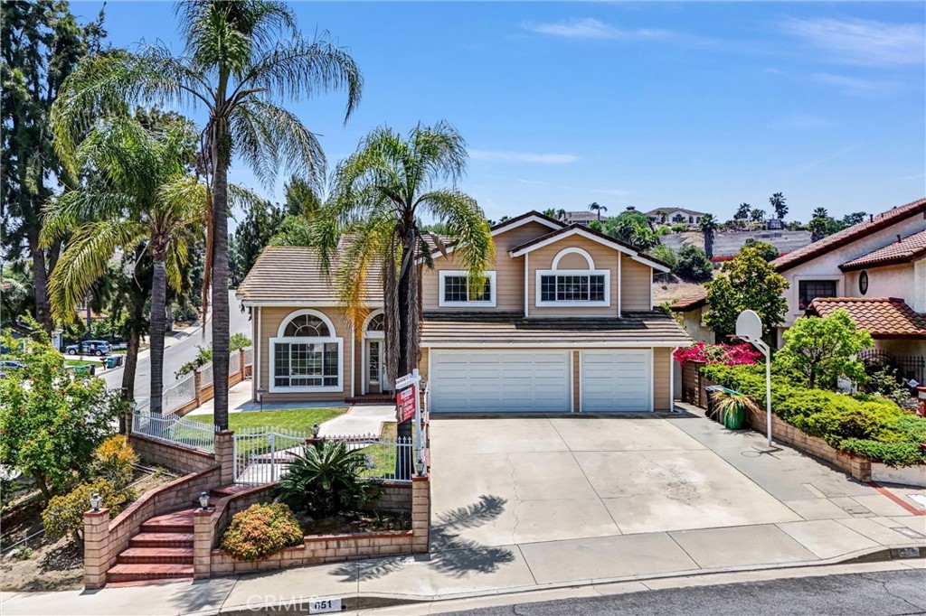 Huge price Drop! Gorgeous two-story single family house located on a large corner lot in south of Diamond Bar is ready to MOVE IN!! There are 4 bedroom, 3 bath in the house, first floor has one bedroom and bathroom for elderly parent or family guest, one large Master suites has huge walk in closet and shower/Bath tub to relaxed. Open Kitchen with granite countertop, stainless steel appliance, with lot of ample cabinetry, and a formal bright, airy dinner area for the whole family, There also a cozy fire place at family room Plus a laundry room that lead to the spaciously into 3-car garage. Additional upgrade whole house with luxury new wood flooring and new interior paint. There are a large back yard and a side fruit garden with covered patio perfect for enjoying a peaceful evening. Conveniently located near restaurant, grocery store, hiking trails and major freeway