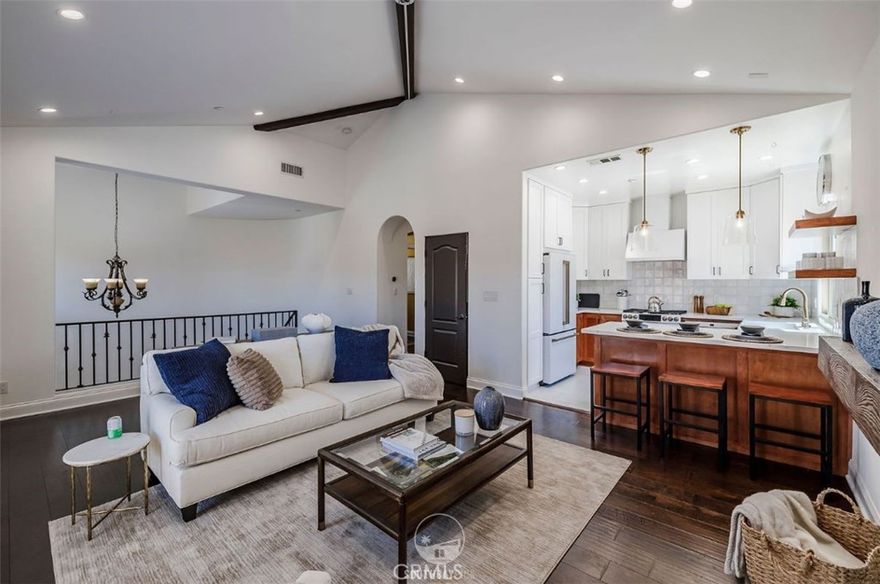 Step into coastal luxury in this beautifully remodeled Redondo Beach detached rear, west-facing townhome, where soaring ceilings and an abundance of natural light create an inviting sense of space. Every detail has been thoughtfully updated, blending modern sophistication with everyday comfort.

The gourmet kitchen is the heart of the home—designed with sleek finishes, premium CAFE all new appliances, and an open flow perfect for both entertaining and daily living. Enjoy multiple balconies that extend your living space, a private yard for outdoor dining or play, and a west-facing orientation that delivers spectacular sunsets year-round. Be mesmerized by not one, but two, fireplaces to stay warm on the rare colder winter's evenings, whether in the privacy of your primary suite or entertaining in the living room.

The expansive primary suite with soaring ceilings offers the perfect retreat, featuring dual vanities, a soaking tub, a separate shower, and ample closet space. Two additional bedrooms on the main level provide comfort and flexibility for family, guests, or a home office. There is a private dining table off the kitchen to gather in a more formal setting.

Upgraded with conveniences including central A/C, central vacuum, and high-end finishes throughout, this residence offers both style and function. Retreat to your spacious bedrooms, unwind in your airy living areas, celebrate with friends over candlelight dinners in the private and manicured backyard, and savor the California lifestyle from the comfort of home.

Ideally located within a short walking distance to award-winning schools, local parks, and the beach, this townhome offers the ultimate blend of convenience, community, and coastal charm.