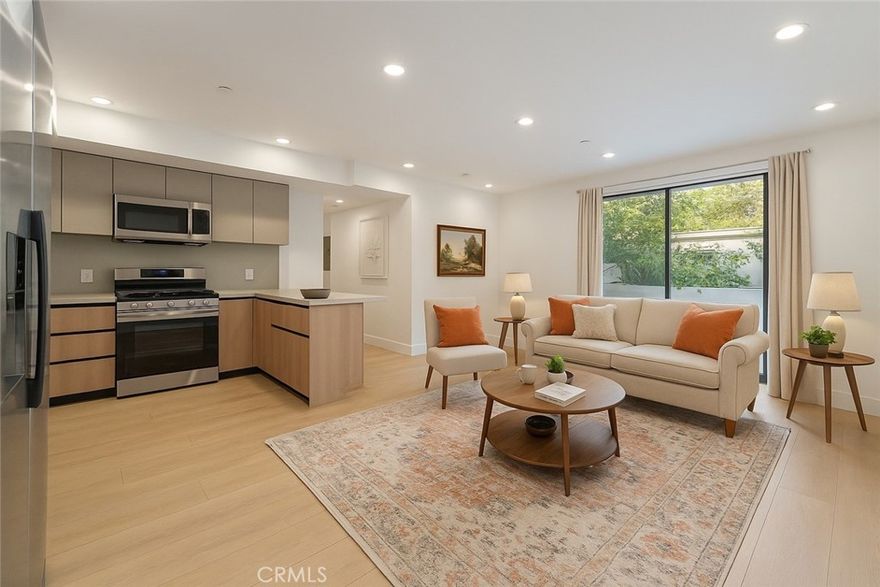 Experience the finest in modern living in this brand new, luxury 3 bedroom, 2 bathroom apartment located in a prime Van Nuys location. The unit features an open-concept design where the designer kitchen with high-end finishes flows seamlessly into the spacious living room, highlighted by large sliding window doors leading to a private patio. Enjoy the unparalleled convenience of an in-unit washer/dryer, secured building access, and premium finishes throughout, all while benefiting from the ideal location with rapid access to the 405 and 101 freeways.