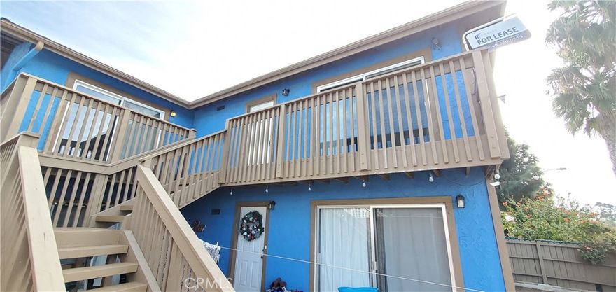 Wonderful upper unit with ocean view.  2 nice size bedrooms, 1.5 bathrooms, large and open kitchen with granite slab counter tops, new granite slab bathroom vanity counter tops, new double pane windows, one car garage, plus driveway parking space.  There is lots of street parking as well.  Perfect location to bike down to Trestles.  Onsite laundry.