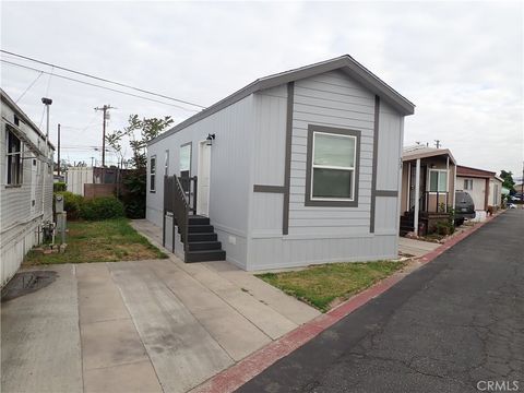 Photo of 5678 Shull St St, Bell Gardens, CA 90201 (MLS # SW26090643)