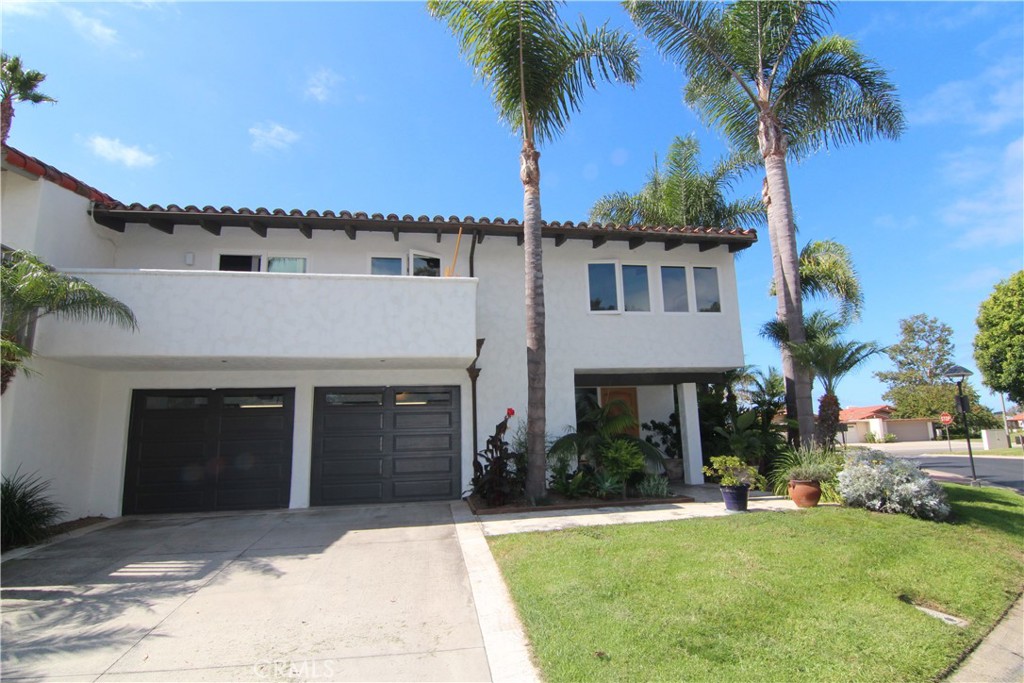 WOW!!! This one is unbelievable!!! Perched on the highest point of the bluffs for the most magnificent sunset views and continuous ocean breeze. 2000 Vista Cajon is located on one of the most desirable and widest streets in the beautiful Bluffs where the original models were showcased!!!! This WONDERFUL end unit Carmelita plan has just what you have been waiting for. This Newport Bluffs home is a 3-bedroom 2 bath all top-level living single family residence!! Recently remodeled with top-of-the-line counter tops, beautiful living and dining area full of light. Upgraded kitchen with Thermador appliances, wine fridge, one-piece Italian marble fireplace Skylights throughout the home. Upgraded bathrooms, wide open patio with panoramic sunset views for al fresco dining on warm Newport nights. This is probably the one of the best patios in the bluffs.
There is a unique patio off the bedrooms for that morning coffee fix. Walnut hardwood floors throughout and lots of storage is a great bonus. The landscape has been meticulously appointed and maintained with the utmost professional gardeners. Please ask agent how to expand the underground sq footage behind the garage. Possible 500 more sq feet to your incredible property. WOW
Close to John Wayne airport, Fashion Island shopping and restaurants, golf, tennis/swim club, award winning schools including Corona del Mar High and Middle school, world class beaches and all the Newport lifestyle has to offer.