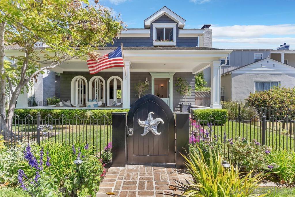Welcome to 1015 Olive Ave, a true gem on the coveted 1000 block of Olive Ave. This timeless property offers the perfect blend of high-end design & beach house chic, masterfully designed by Cara Clancy to create enchanting yet livable rooms and spaces. Step inside and be greeted by custom, rounded pivoting beveled glass windows that fill the living areas with natural light and controlled breezes, and hand-scraped DuChateau oak floors. Savor the coastal atmosphere on one of the finest front porches on the Island. Three custom Dutch doors and a NanaWall door system tastefully bring the outdoors in. The home boasts whimsical handmade corkscrew stair railings under an oversized handmade beveled glass picture window. The primary suite is a true retreat, featuring a vaulted ceiling, his & her private baths/walk-in closets. One of the three ensuite guest rooms includes its own private loft. The gourmet kitchen is a chef's dream - equipped with three ovens, warming drawer, refrigerated wine storage, beverage drawers, ice maker, butler's pantry, two 36” Thermador refrigerators, and a Thermador Professional range. The laundry room offers double washer/dryer units and ample storage space. The detached guest cottage/office includes a full bath, W/D and kitchenette. Come experience the perfect blend of luxury and coastal living at 1015 Olive Avenue. HOME MAY BE PURCHASED COMPLETELY FURNISHED AND TURN-KEY, WITH A LEGACY MEMBERSHIP TO THE EXCLUSIVE CLUB AT THE HOTEL DEL CORONADO. The home includes a Sonos/Savant AV system and a whole-house water filtration system. HOME MAY BE PURCHASED COMPLETELY FURNISHED AND TURN-KEY, WITH A LEGACY MEMBERSHIP TO THE EXCLUSIVE CLUB AT THE HOTEL DEL CORONADO.