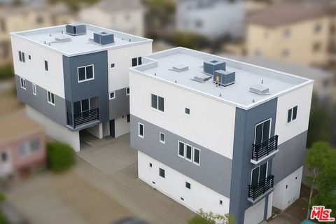 Photo of 125 N Mountain View Avenue, Los Angeles, CA 90026 (MLS # 25597883)