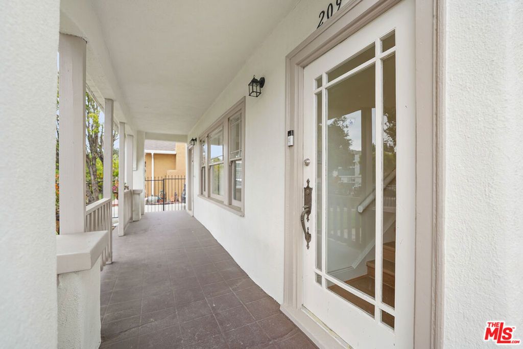 Photo of 209 N Ave 57 Ave, Los Angeles, CA 90042 (MLS # 25534015)