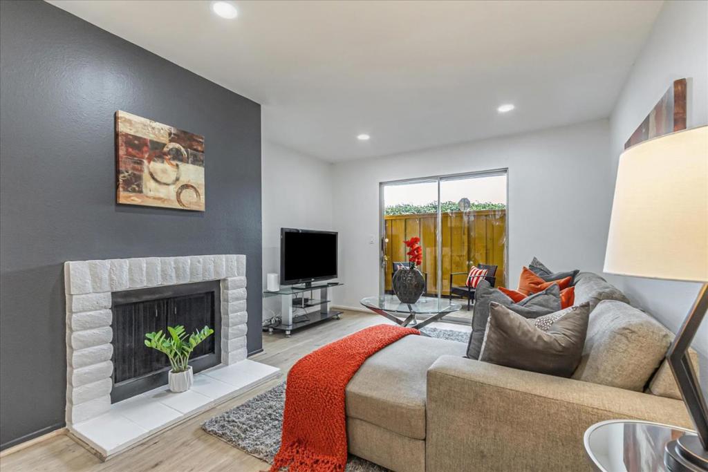 JUST REDUCED!! Stylish & Sophisticated 1-Bedroom Condo in Prime Location! -BLDG #2, UNIT 105 Discover comfort and elegance in this beautifully updated 1-bedroom, 1-bathroom first-level condo in the gated Mission Grove community. With 777 sq. ft. of thoughtfully designed living space, this home offers modern upgrades. The spacious living area features recessed lighting, wide plank laminate flooring, and a cozy fireplace, creating a warm and inviting ambiance. The gourmet kitchen boasts quartz countertops, a stunning mosaic backsplash, a brand-new range and hood, and crisp white cabinetry, perfect for cooking and entertaining. Throughout the home, designer touches include stylish accent walls, new light fixtures, recessed lighting, and a walk-in closet with built-in organizers, offering both style and functionality. A private patio provides the perfect space to unwind and enjoy tranquil evenings. Residents can take advantage of the community pool, ideal for summer relaxation. Conveniently located near Penitencia Creek Park, Alum Rock shops, and major commuting routes, including Capitol Expressway, 680, 101, and VTA Light Rail, this home offers both comfort and convenience. One dedicated parking spot and a small storage unit are included. Dont miss this incredible opportunity!