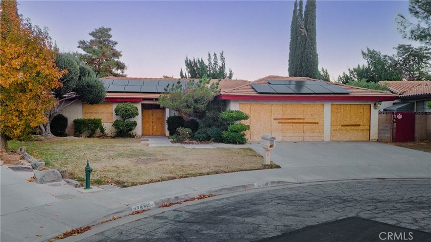 Welcome to this single-story home situated on a beautiful cul-de-sac in the heart of Lancaster. This property offers a well-designed layout and appealing features, beginning with a 3-car garage and a backyard ideal for outdoor entertaining, complete with a covered patio and an inground pool and spa. The interior layout includes an open kitchen connected to an eat-in dining area and a living room accented by a stone fireplace. Separate living and dining rooms add flexibility for a variety of uses. The split floor plan places the primary suite on one side of the home, featuring an en-suite bathroom with a soaking tub and tiled shower. Two additional bedrooms and a second bathroom are located on the opposite side of the house, offering a practical and comfortable arrangement. An indoor laundry room adds to the home's functionality. With ample space and great foundational features, this property presents an excellent opportunity to bring your ideas and transform it into a true showstopper—a wonderful chance to create a home tailored to your vision.