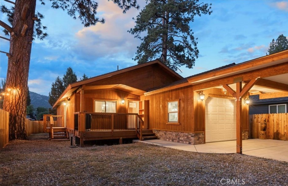 Charming Big Bear City Retreat – Close to Everything! Discover the perfect mountain getaway in this beautifully maintained Big Bear City home, ideally located just minutes from Bear Mountain Ski Resort, Bear Mountain Golf Course, the Big Bear Alpine Zoo, scenic national forest trails, local restaurants, and shops. A short drive takes you to Snow Summit Resort and the bustling Village, making this the ultimate base for year-round adventure. Inside, you’ll find an inviting open floor plan filled with natural light for relaxing or entertaining. The kitchen features a cozy breakfast bar that opens to the main living area, creating a welcoming space for friends and family to gather. Enjoy a fun-filled game room located in the converted garage for après-ski hangouts or rainy-day entertainment. Whether you're looking for a weekend escape, a vacation rental, or a full-time mountain home, this property offers comfort, convenience, and easy access to everything Big Bear.