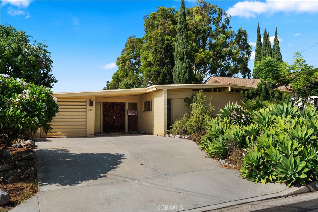 Welcome to 11531 Sunnybrook Lane, a rare opportunity to own a beautifully preserved original home in one of Whittier’s most desirable neighborhoods. Situated on an expansive 12,204 SQFT lot and overlooking the lush fairways of the golf course, this charming residence offers 3 bedrooms, 2 bathrooms, and 1,176 SQFT of living space.
From the moment you walk through the front door, you’re greeted with sweeping views that stretch all the way to the back of the home, creating a serene backdrop perfect for everyday living. The interior features customized doors and a unique fireplace, adding warmth and character to the original design.
Step outside and you’ll find an empty pool, offering the perfect opportunity to restore it to its former glory or reimagine the space to suit your vision. The oversized lot provides exceptional potential for an ADU (Accessory Dwelling Unit), making this property a smart investment with room to grow.
This is more than just a home—it’s a chance to create your dream property in an unbeatable location. Whether you’re looking to preserve its original charm or add modern updates, the possibilities are endless.
Don’t miss this unique opportunity to live in a golf-course community with a pool, views, and incredible lot size.