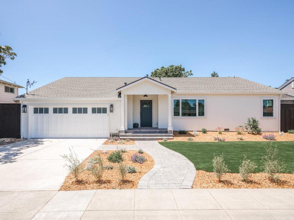 Step into effortless California living in this thoughtfully remodeled single-story home, where timeless design meets modern comfort. Rebuilt from the studs up with a spacious addition, this 4-bedroom, 3-bathroom residence offers an expansive great room with 9.5 ft ceilings, and seamless indoor-outdoor flow, ideal for daily living and unforgettable gatherings. The heart of the home is a chefs kitchen with a 48" range, custom cabinetry, generous island, and butlers pantry. The living area is anchored by a cozy fireplace with custom built-ins. The great room opens to a lush, low-maintenance backyard designed for year-round entertaining, featuring multiple seating areas, a fire pit, and potential space for a pool or ADU. Two of four bedrooms are en suite, including a luxurious primary retreat with a vaulted ceiling, dual closets, and a spa-like bath with heated floors, Zellige tile, and a soaking tub. Throughout the home, you'll find rich mouldings, European white oak floors, designer finishes, and curated lighting. Additional highlights include a massive storage attic, oversized two-car garage, and a beautifully landscaped front yard. Just 0.6 miles from Stafford Park, 0.7 miles to Roosevelt Plaza, and 1.4 miles to Downtown, this home blends elevated style with everyday convenience.