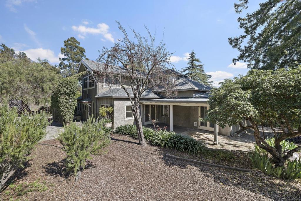Once in a lifetime opportunity to purchase over an acre with three residential homes just blocks from Downtown Los Gatos / Create your own private estate or enjoy the primary residence of more than 3000 square feet with 5 bedrooms and 3 bathrooms / Separate cottage over 800 square feet with one bath and private laundry with garage access / Studio built with permits is a perfect ADU over 200 square feet / Four car garage / Additional out buildings include an artist studio and separate workshop / The property will be sold as is but that makes it ready for your improvement selections / You can choose hardwood or luxury vinyl plank flooring / You can replace the vinyl with tile / Decide if you want quartz or granite counters in the kitchen and baths atop your new custom cabinets / Maybe you will add dual pane windows and upgrade the heater and air conditioning / We encourage you to convert the wood burning fireplace to natural gas / You could compliment everything with warm color paint and may we suggest crisp white moldings / The low maintenance grounds might become your private vineyard / Take a stroll into town for the best of everything Los Gatos / Easy access to commute corridors will get you or your tenants quickly to the Coast or anywhere in Silicon Valley / Welcome Home !