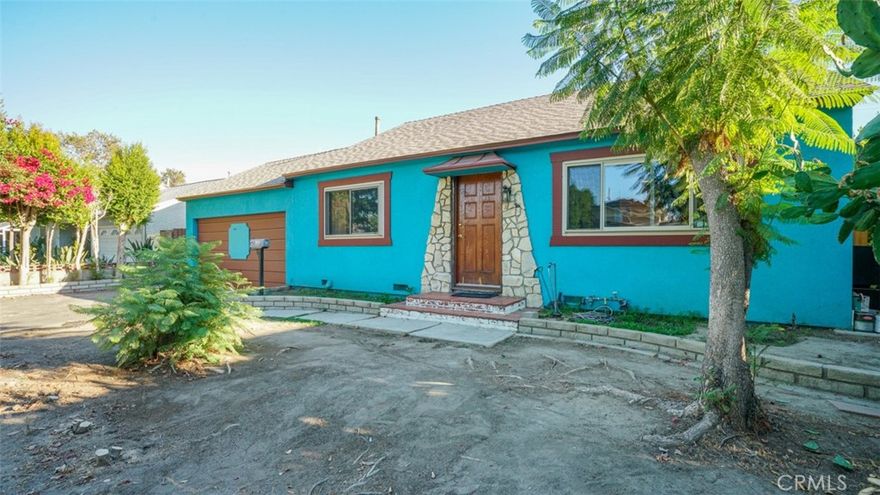 Welcome Home! Perfectly situated on the edge of North Hollywood—just three houses from Burbank’s Valley Skate Park—this home offers a rare blend of location and potential. Inside, you’ll find open-concept living with a spacious eating counter and expansive double-pane windows that flood the home with natural light. A large family room, complete with fireplace and soaring vaulted ceilings, provides the perfect canvas to create a dream primary suite or an entertainer’s retreat.

Step outside to enjoy the expansive, tree-lined yard and a generous covered lanai, ideal for year-round gatherings or peaceful relaxation.

With its prime location and flexible layout, this property is brimming with opportunity. All it takes is your imagination to transform it into something truly extraordinary.